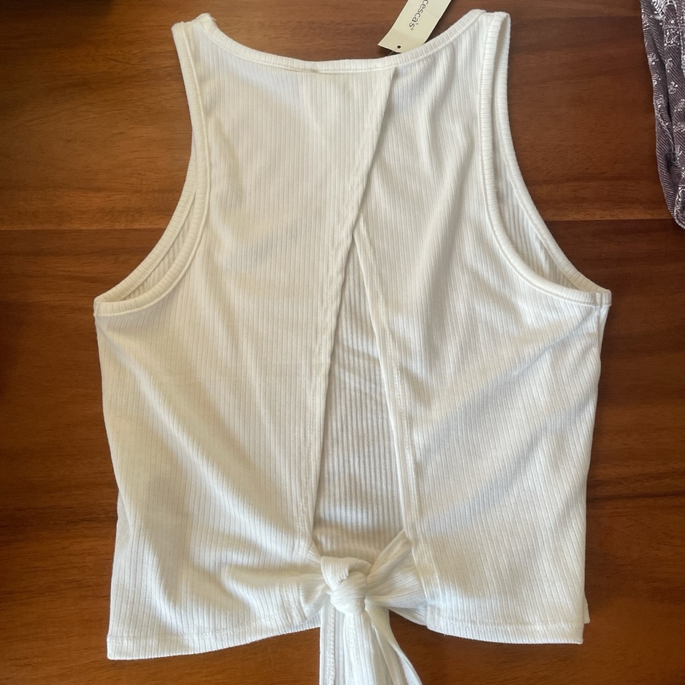 francesca’s open back white tank
